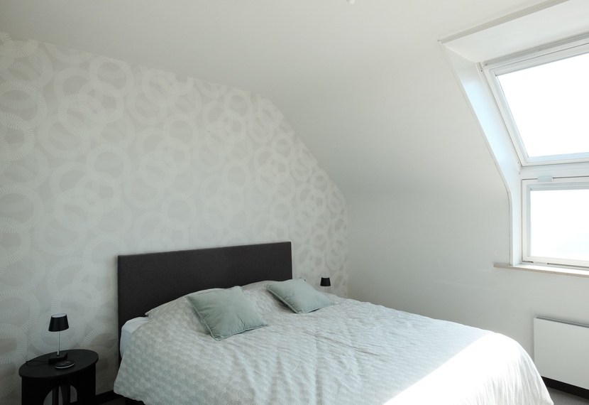 Gezellig dakappartement met 2 slaapkamers, terras en garage te Roeselare
