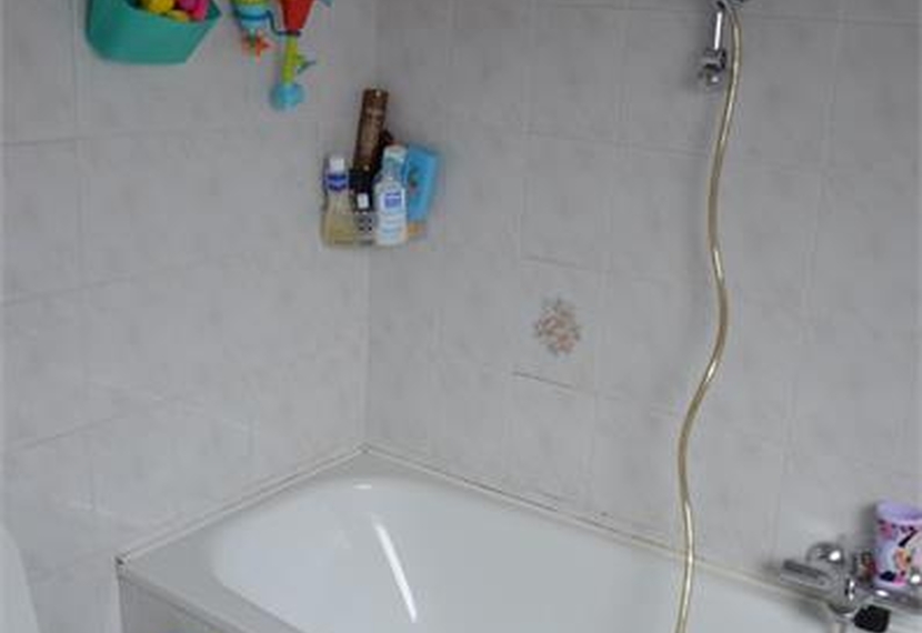 Instapklaar dakappartement met terras en autostandplaats in Ardooie