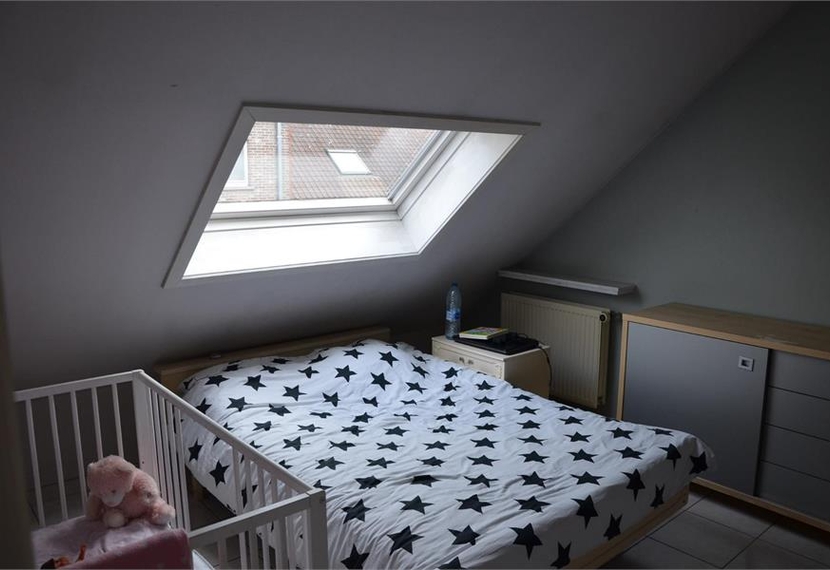 Instapklaar dakappartement met terras en autostandplaats in Ardooie